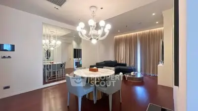 Elegant living room with modern chandelier and stylish furniture