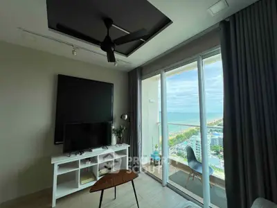 Modern living room with balcony and stunning ocean view