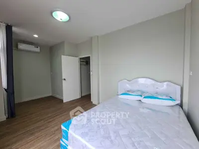 Spacious bedroom with modern design and natural light