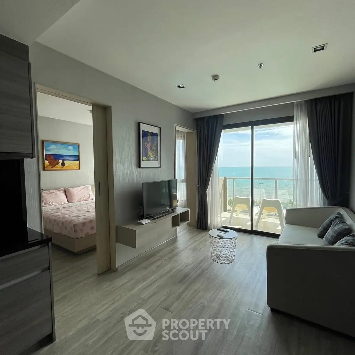 Stunning beachfront living room with ocean view and modern decor