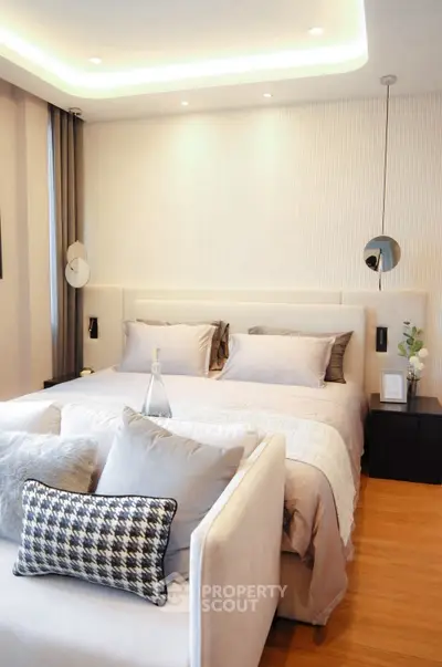 Luxurious modern bedroom with elegant decor and ambient lighting