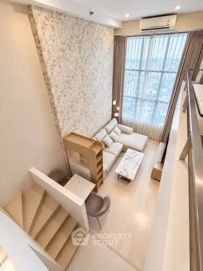 Luxurious loft-style living room with high ceilings and panoramic city views.