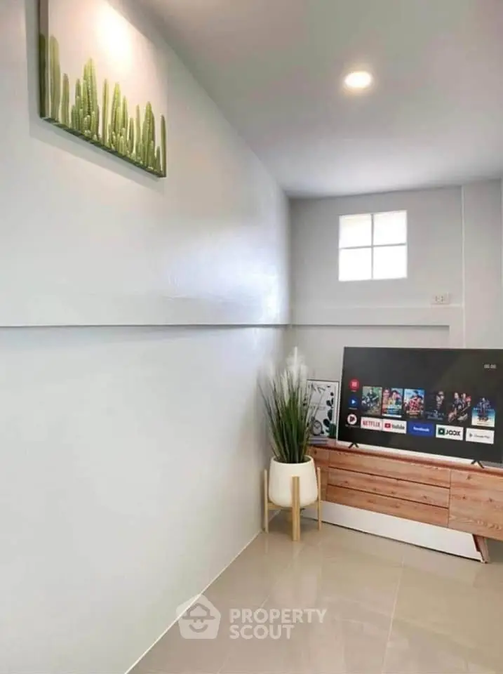 Modern living room with sleek TV setup and stylish decor