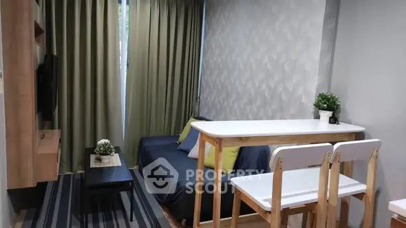 Modern living room with stylish furniture and cozy ambiance.