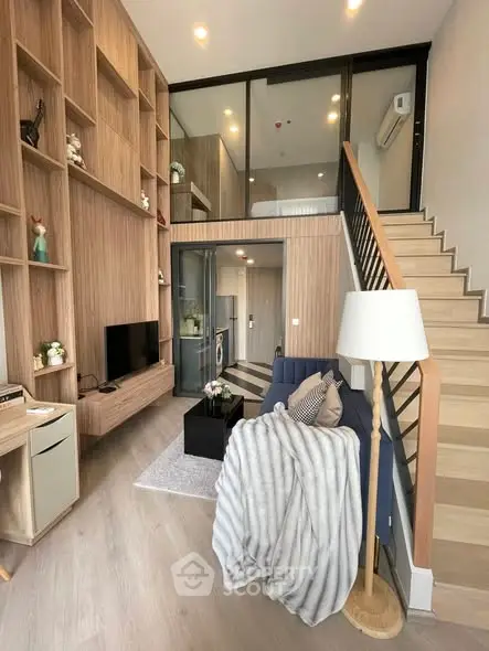 Modern loft apartment with stylish wooden interior and cozy living area