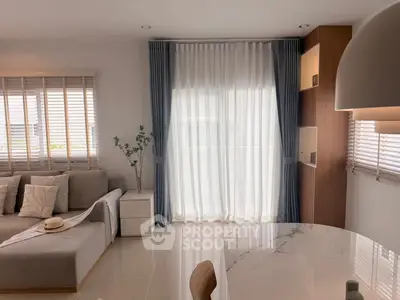 Modern living room with elegant decor and natural light