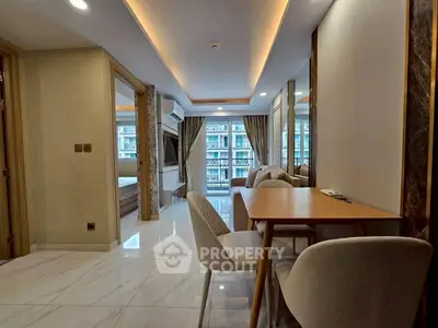 Modern living room with elegant dining area and city view balcony