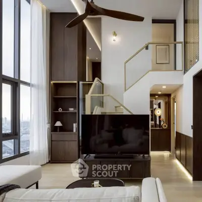 Luxurious modern living room with high ceilings, large windows, and elegant wooden finishes.