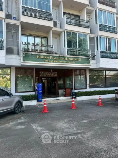 Hillside Payap Condominium 8 entrance with parking area and modern facade.