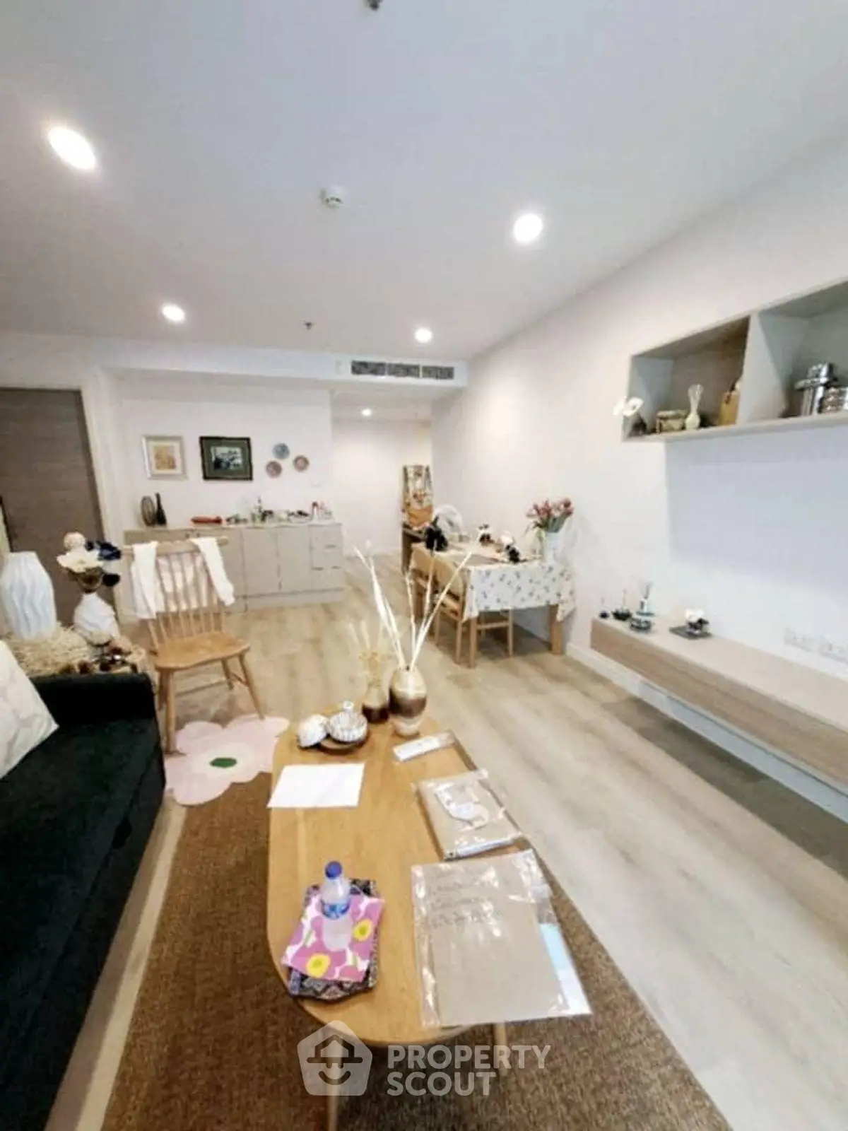 Modern living room with stylish decor and wooden furniture