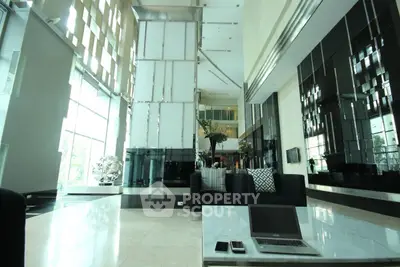 Luxurious modern living room with high ceilings and elegant decor