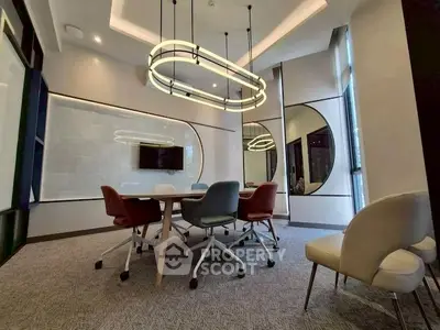 Modern conference room with stylish lighting and contemporary furniture