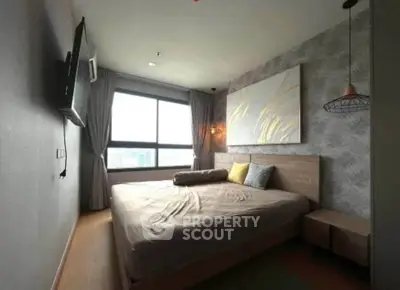 Modern bedroom with large window and stylish decor in a high-rise apartment.