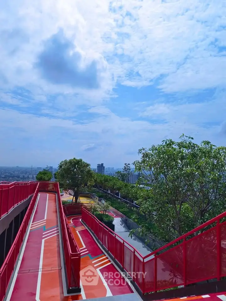 Stunning rooftop view with vibrant walkway and lush greenery, perfect for urban relaxation.