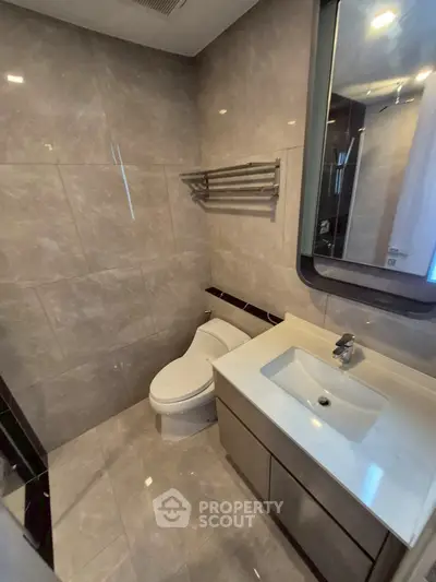 Modern bathroom with sleek fixtures and elegant tile design