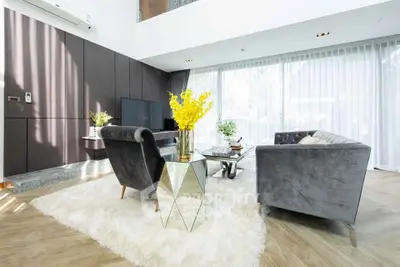 Luxurious living room with plush velvet sofas and modern decor