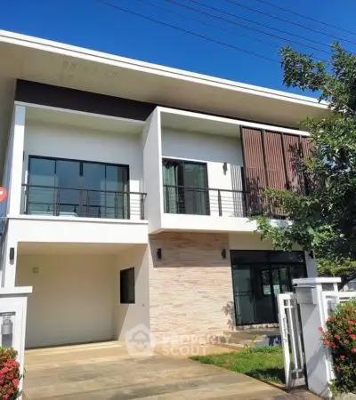 Modern two-story house with sleek design and spacious driveway