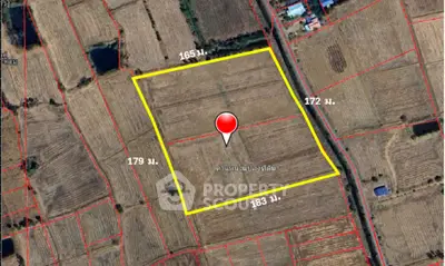 Aerial view of agricultural land plot with boundary lines and measurements.
