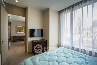 Modern bedroom with city view and stylish decor