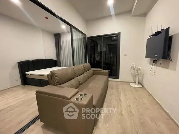 Modern studio apartment with sleek design and cozy furnishings