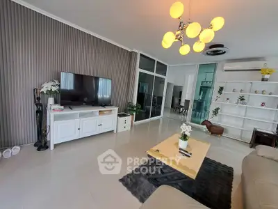 Spacious modern living room with elegant decor and stylish lighting