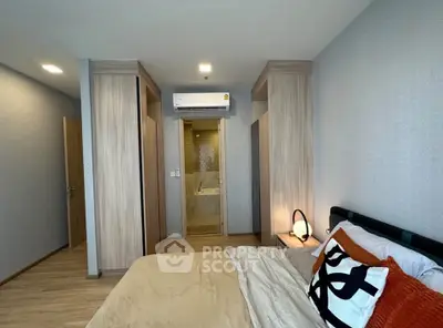 Modern bedroom with ensuite bathroom and stylish decor