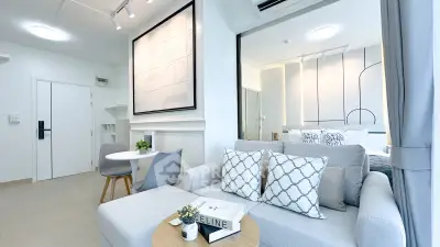 Modern studio apartment with stylish decor and cozy living area
