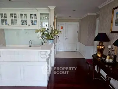 Elegant interior with classic decor and open kitchen layout