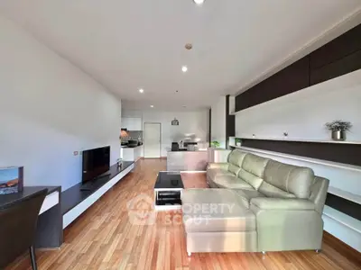 Spacious modern living room with sleek design and cozy seating area