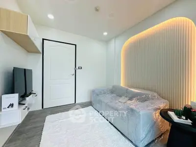 Modern living room with stylish lighting and cozy decor