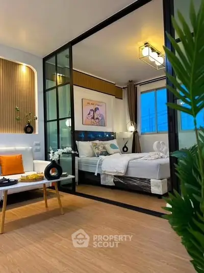 Modern bedroom with glass partition and stylish decor