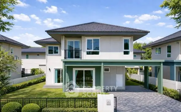 Modern two-story house with landscaped garden and spacious driveway in a serene neighborhood.