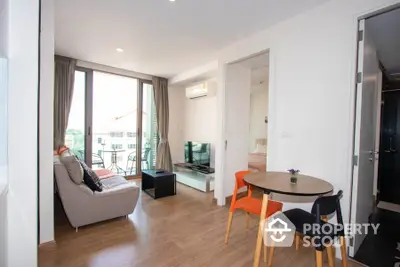 Modern living room with balcony view in stylish apartment