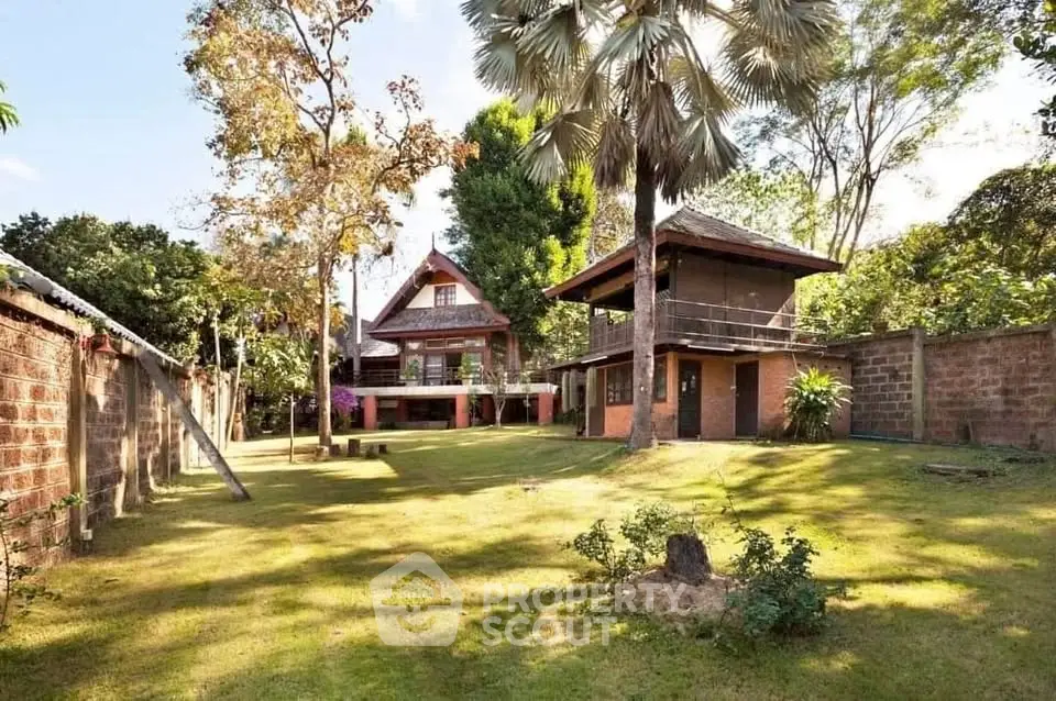 Charming rustic home with lush garden and unique architecture, perfect for nature lovers seeking tranquility.