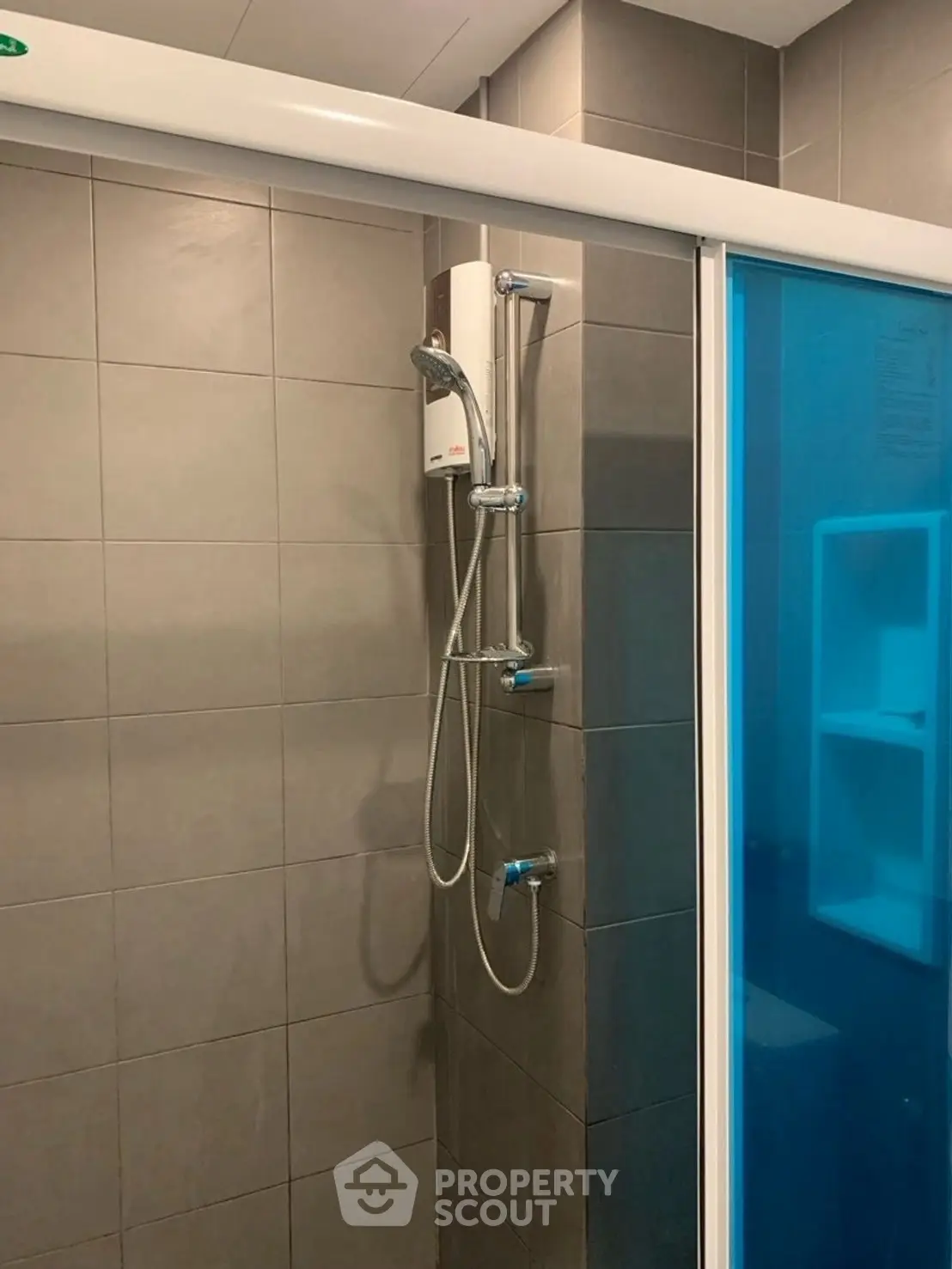 Modern bathroom with sleek shower design and glass partition
