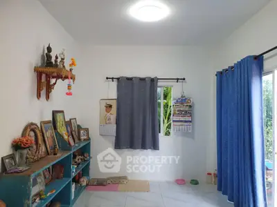 Cozy interior room with natural light and decorative shelves