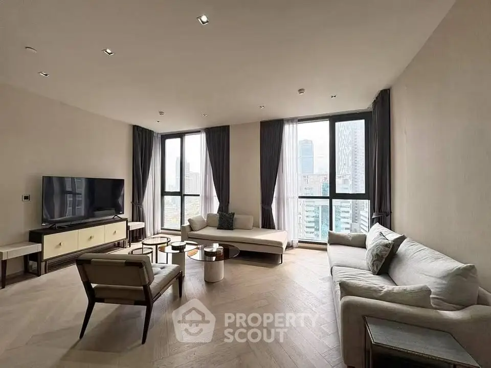 Spacious modern living room with large windows and city view