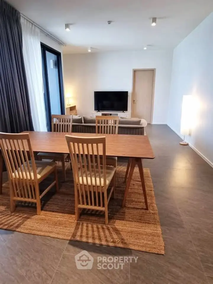 Spacious modern living room with dining area and stylish furniture