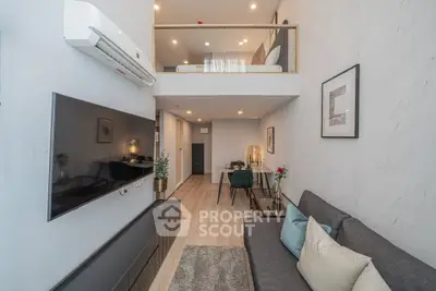 Modern loft apartment with stylish living room and mezzanine bedroom