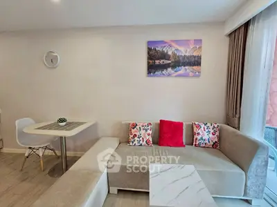 Modern living room with stylish sofa and dining area in a cozy apartment