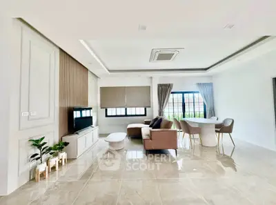 Spacious modern living room with elegant decor and natural light