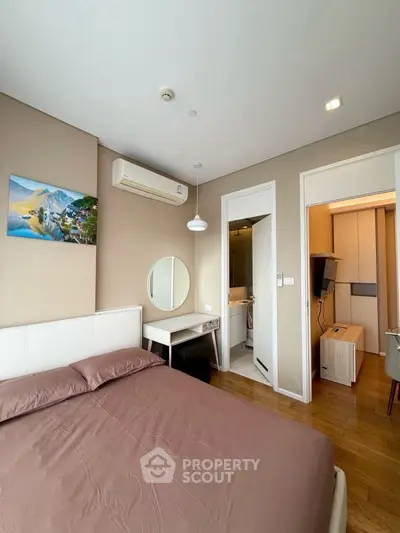 Modern bedroom with ensuite bathroom and stylish decor