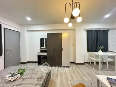 Modern studio apartment with stylish decor and cozy ambiance