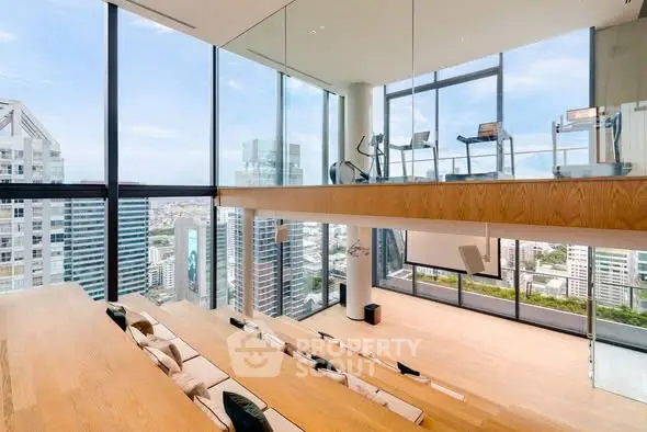 Luxurious modern living space with floor-to-ceiling windows and stunning city views.