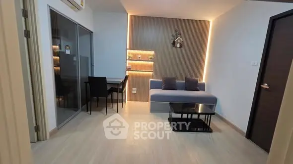 Modern living room with stylish lighting and sleek furniture