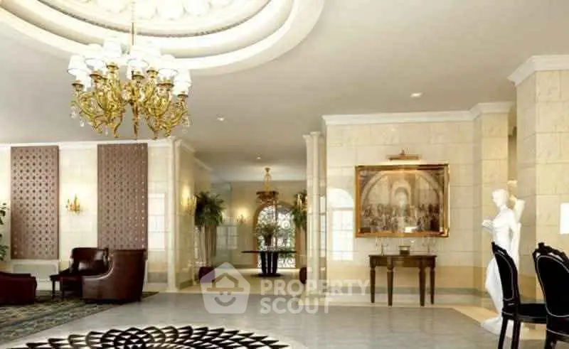 Luxurious building lobby with elegant chandelier and classic decor