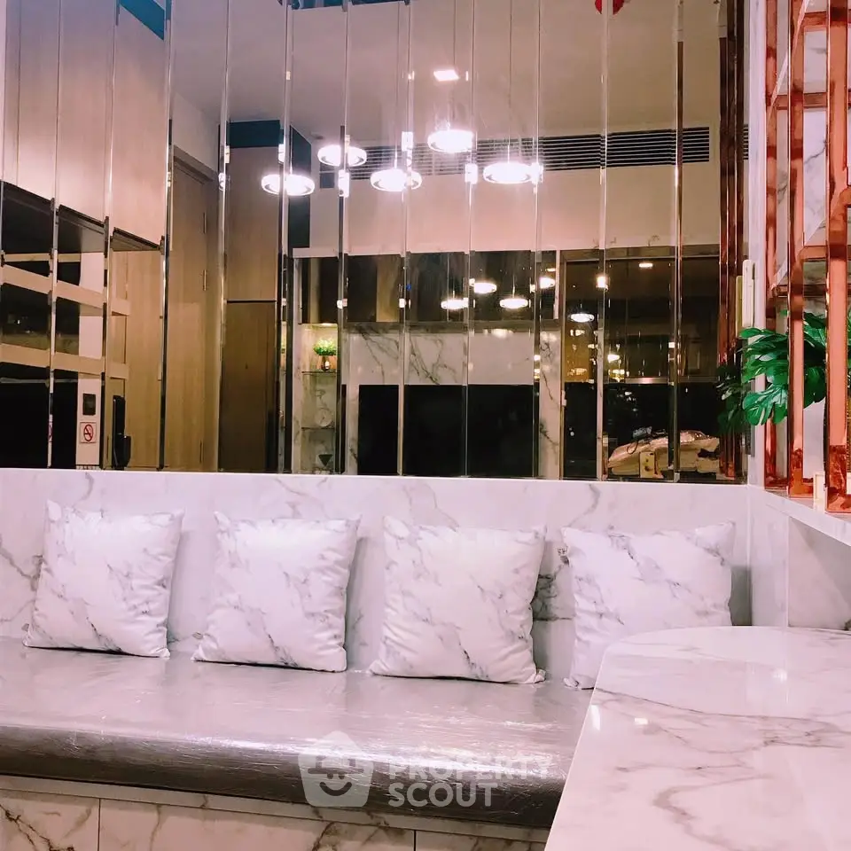 Luxurious modern interior with marble accents and elegant lighting, perfect for sophisticated living.