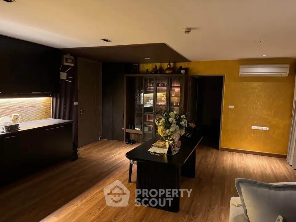 Stylish modern living room with wooden flooring and elegant decor