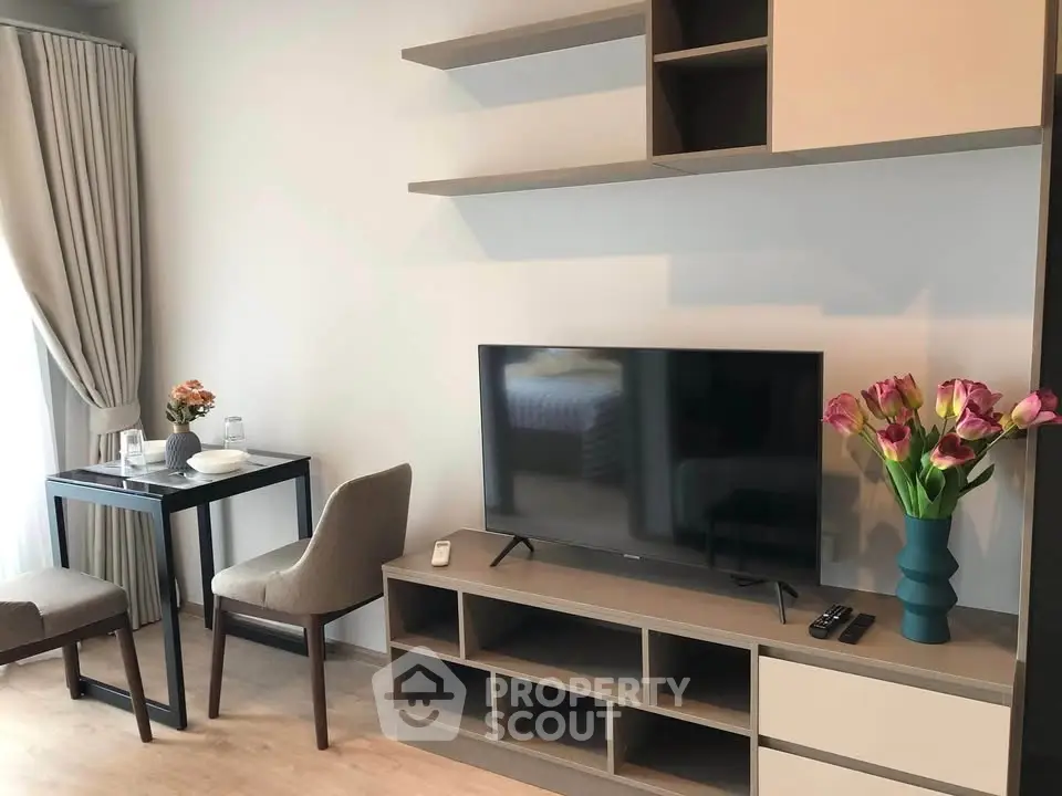 Modern living room with sleek TV stand and elegant decor