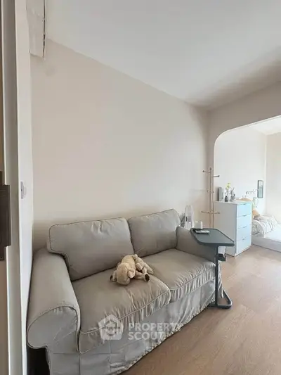 Cozy living room with plush sofa and modern decor